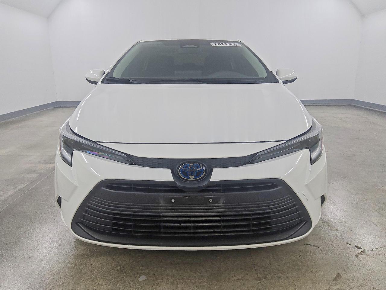 2024 Toyota Corolla Hybrid Le White vin: JTDBCMFE3R3062479