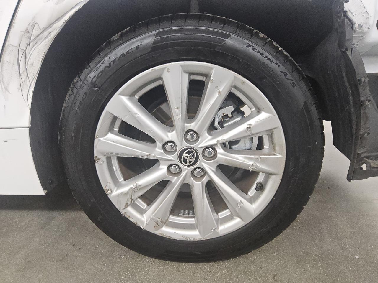2024 Toyota Corolla Hybrid Le White vin: JTDBCMFE3R3062479 Damage: Left Rear Wheel, Curb Rash, > 12 Inches