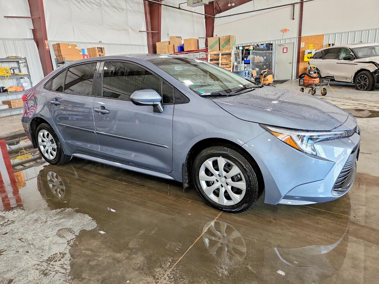 2025 Toyota Corolla Hybrid Le Blue vin: JTDBCMFE3S3105613