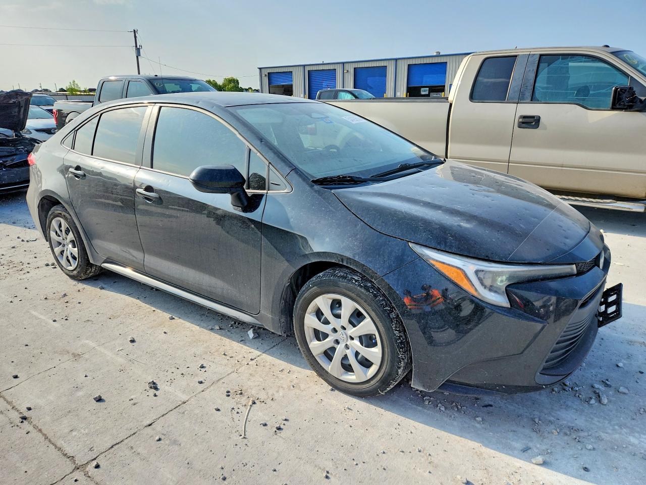 2024 Toyota Corolla Hybrid Le Black vin: JTDBCMFE4R3030480