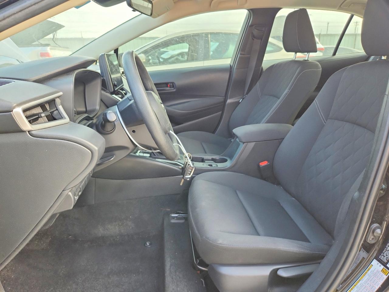 2024 Toyota Corolla Hybrid Le Black vin: JTDBCMFE4R3030480