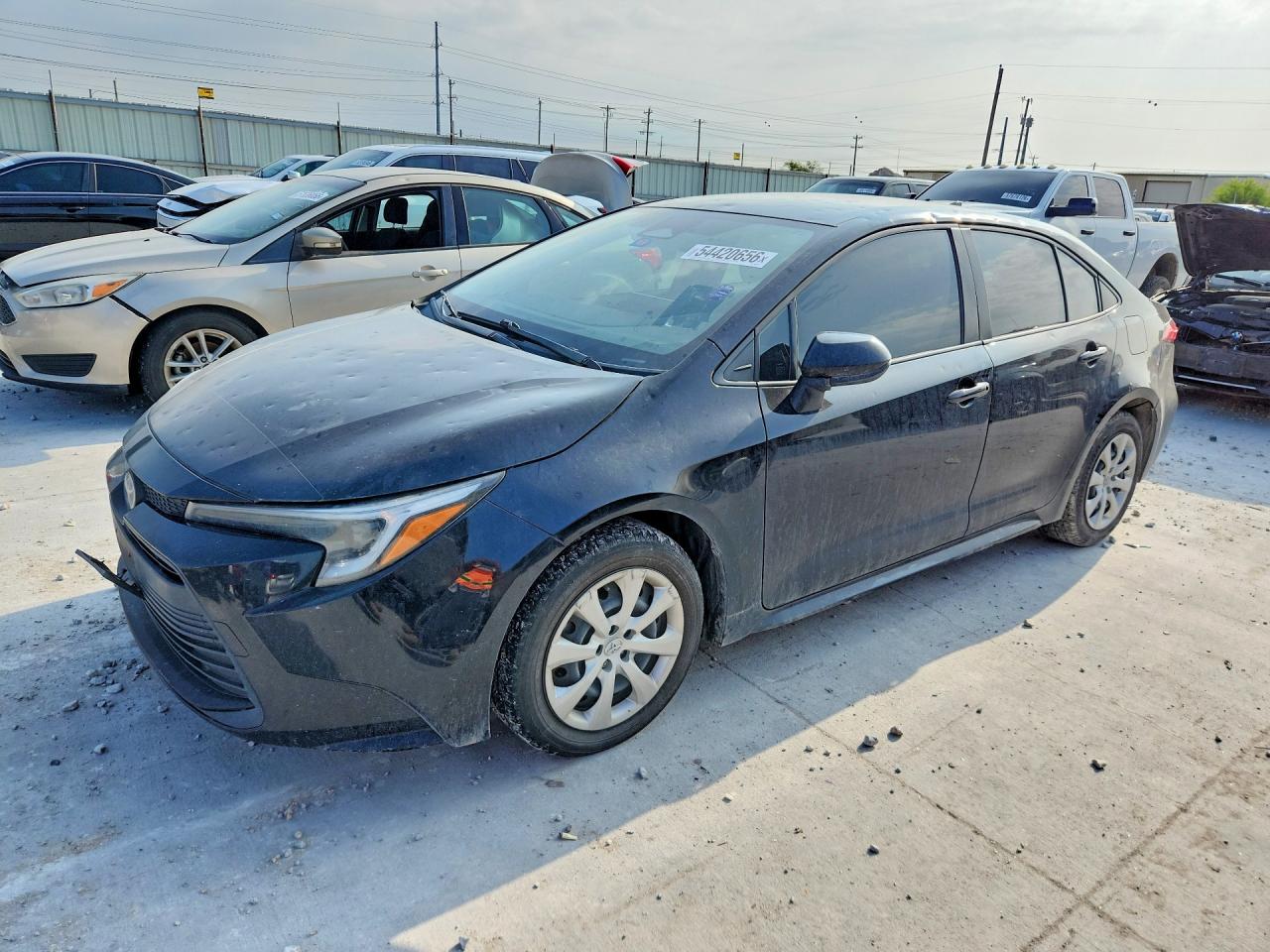 2024 Toyota Corolla Hybrid Le Black vin: JTDBCMFE4R3030480
