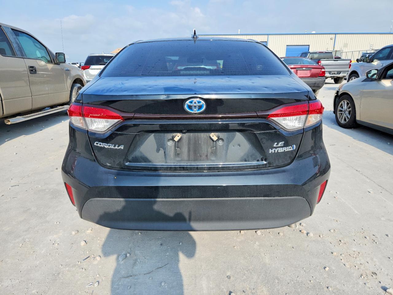 2024 Toyota Corolla Hybrid Le Black vin: JTDBCMFE4R3030480
