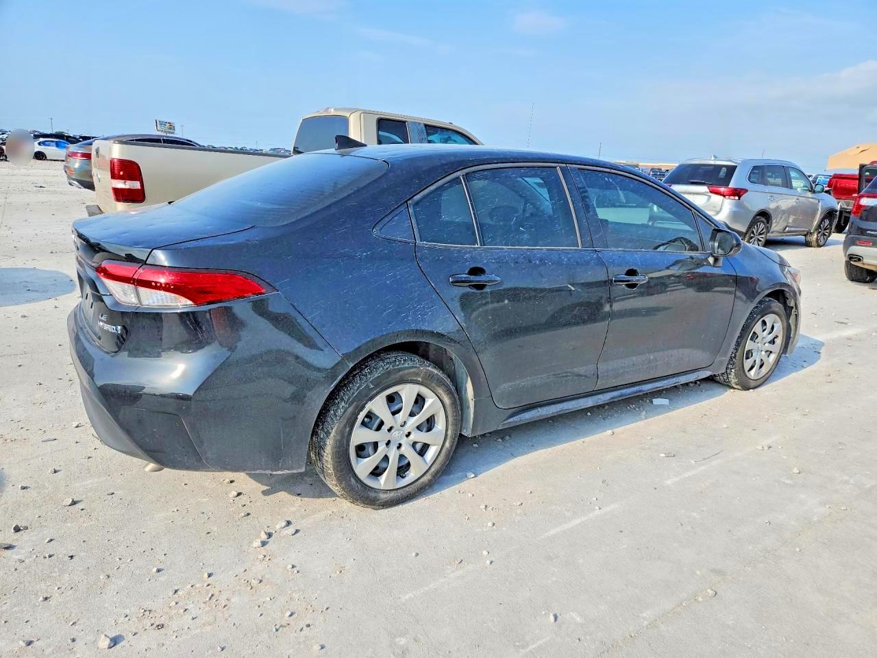 2024 Toyota Corolla Hybrid Le Black vin: JTDBCMFE4R3030480