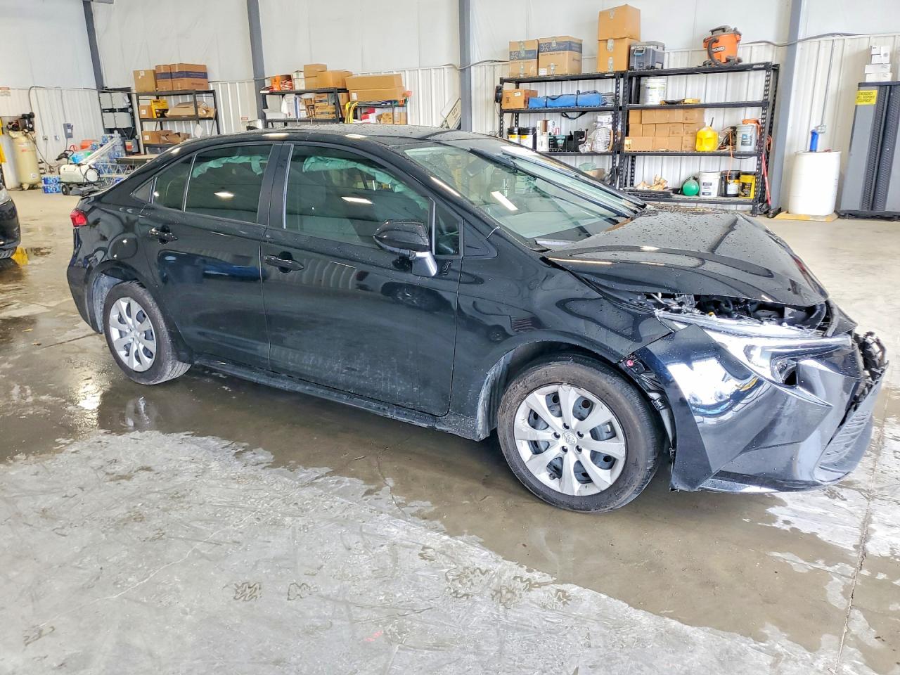 2025 Toyota Corolla Hybrid Le Black vin: JTDBCMFE4S3072136
