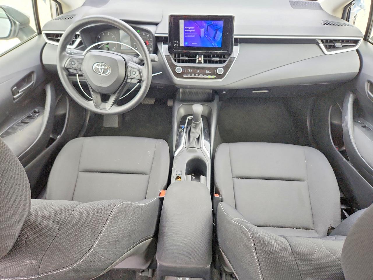 2025 Toyota Corolla Hybrid Le Silver vin: JTDBCMFE4S3075442
