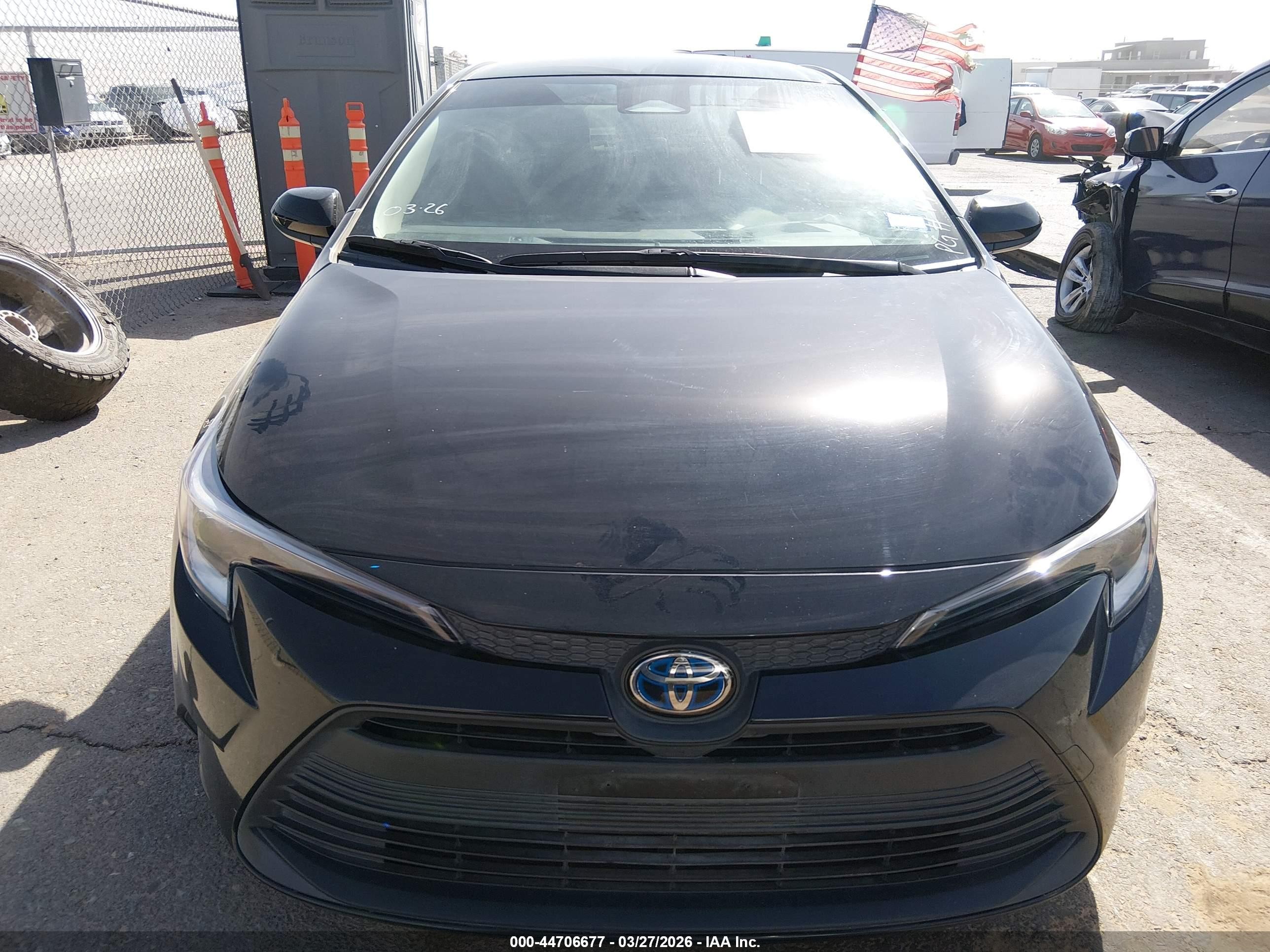 2024 Toyota Corolla Hybrid Le Black vin: JTDBCMFE5R3032089