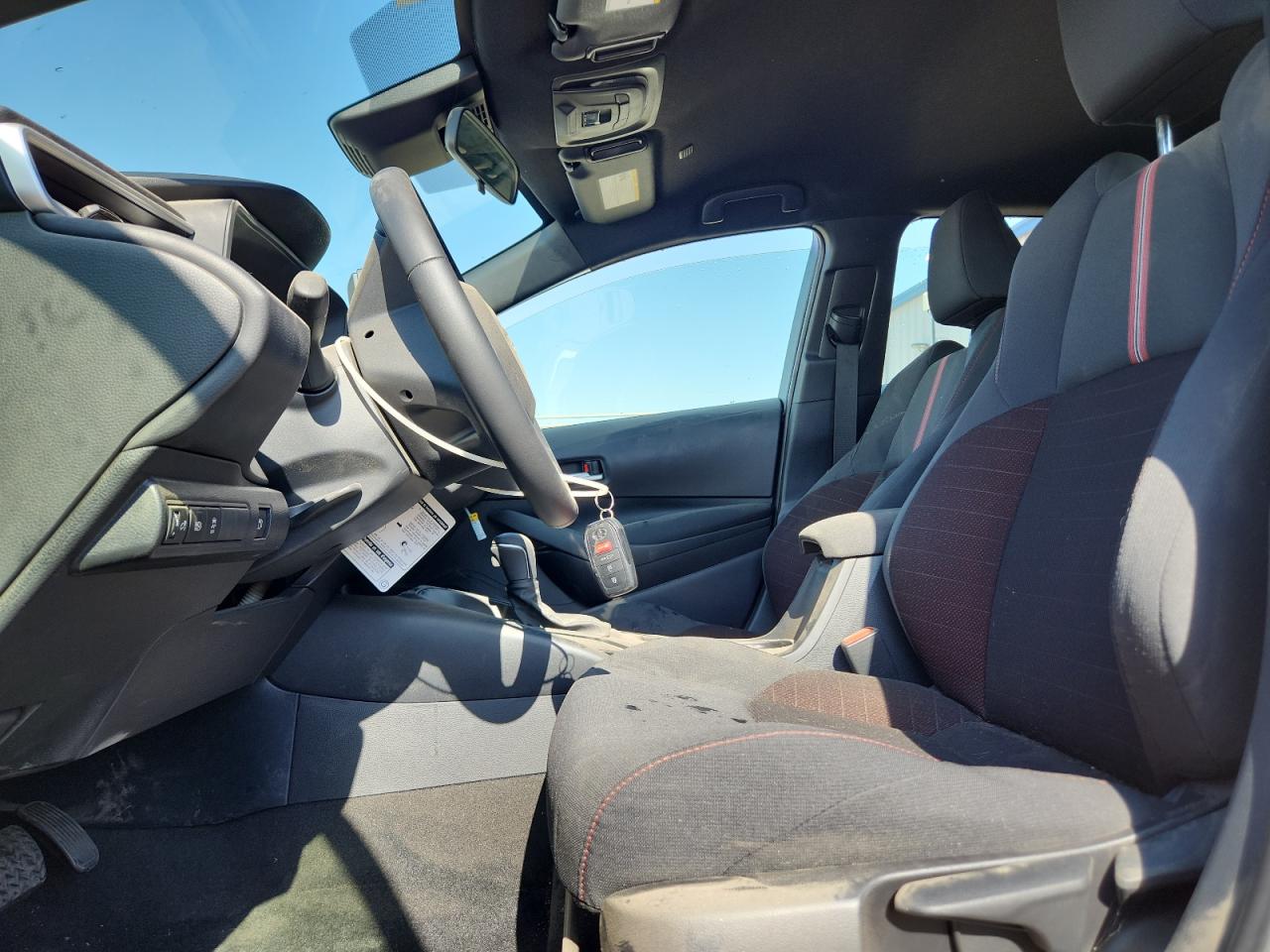 2026 Toyota Corolla Hybrid Se White vin: JTDBCMFE6T3147680 Damage: Left Front Seat, Stained, Permanent