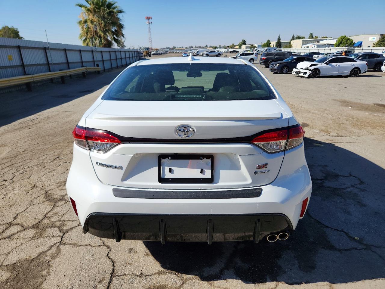 2026 Toyota Corolla Hybrid Se White vin: JTDBCMFE6T3147680