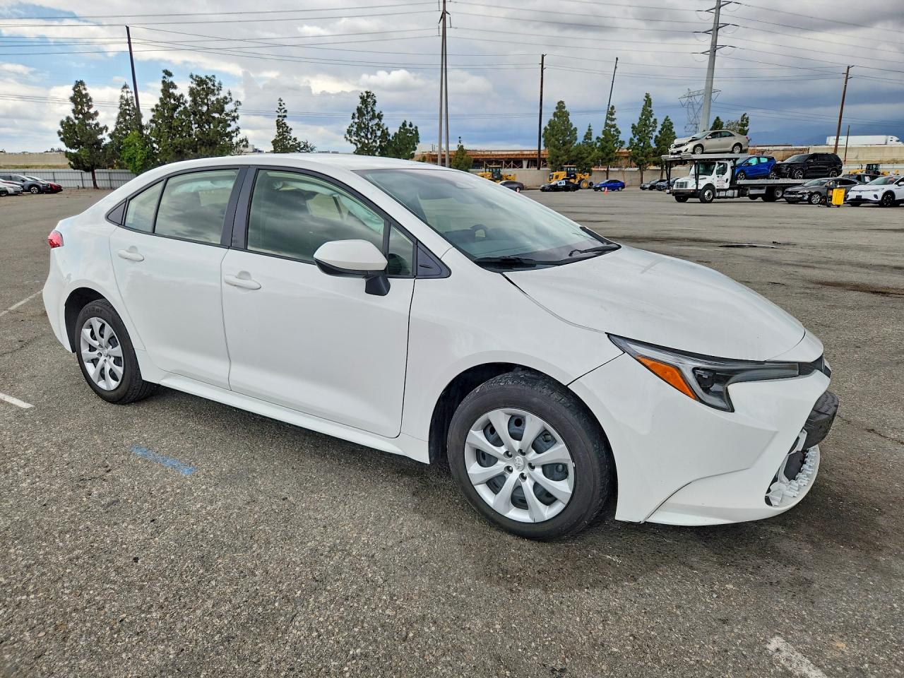 2025 Toyota Corolla Hybrid Le White vin: JTDBCMFEXS3088051