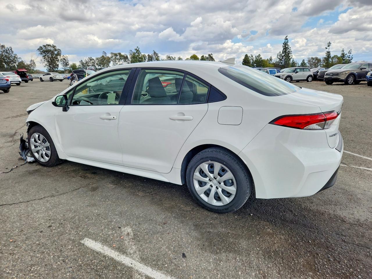 2025 Toyota Corolla Hybrid Le White vin: JTDBCMFEXS3088051