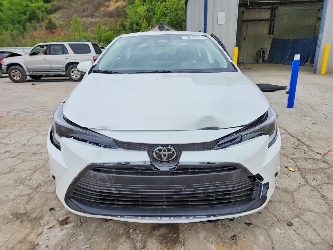 2026 Toyota Corolla Hybrid Le White vin: JTDBCMFEXT3147584