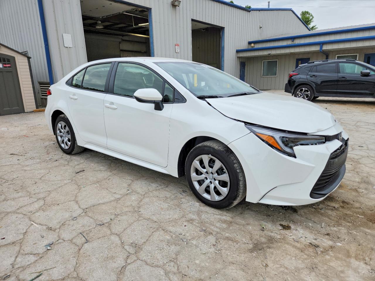 2026 Toyota Corolla Hybrid Le White vin: JTDBCMFEXT3147584