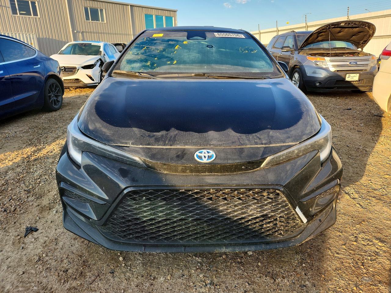 2024 Toyota Corolla Hybrid Le Black vin: JTDBDMHE0RJ008319