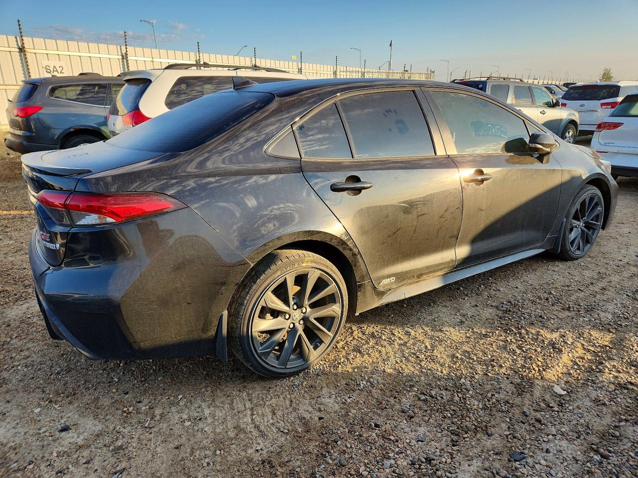 2024 Toyota Corolla Hybrid Le Black vin: JTDBDMHE0RJ008319