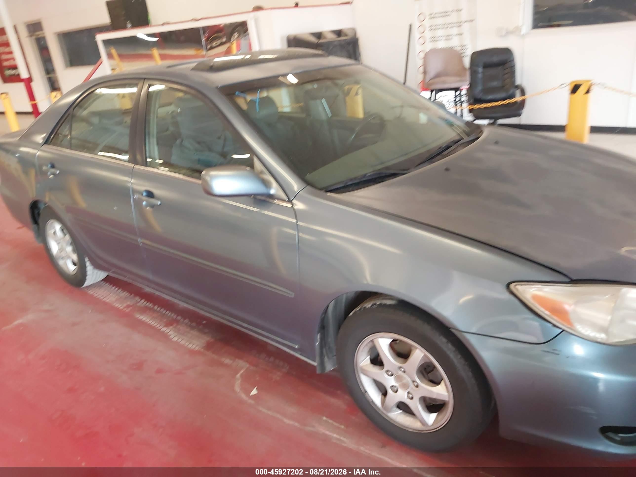 2002 Toyota Camry Le Gray vin: JTDBE30K320019996