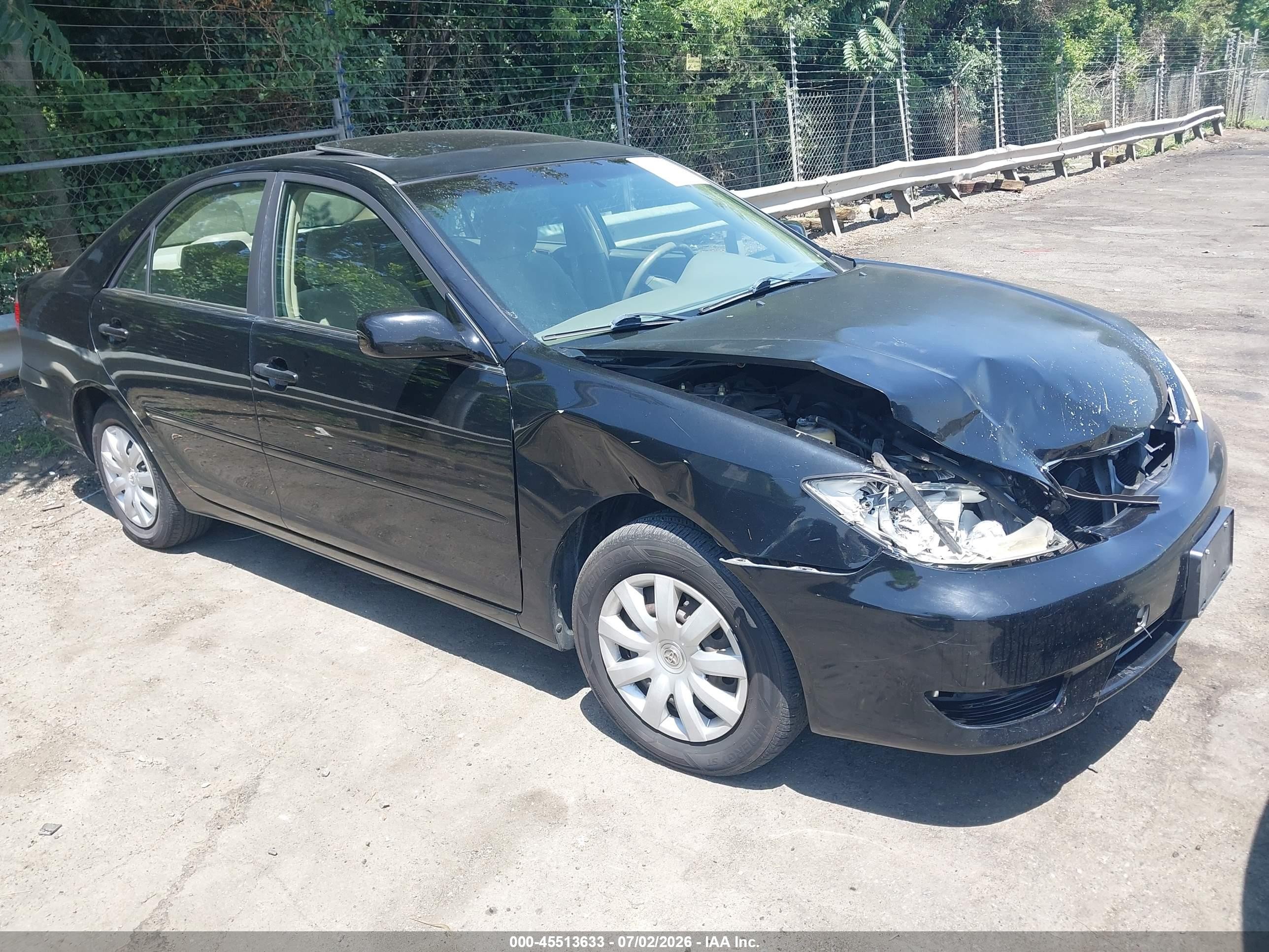 2005 Toyota Camry Le Black vin: JTDBE30K553033529
