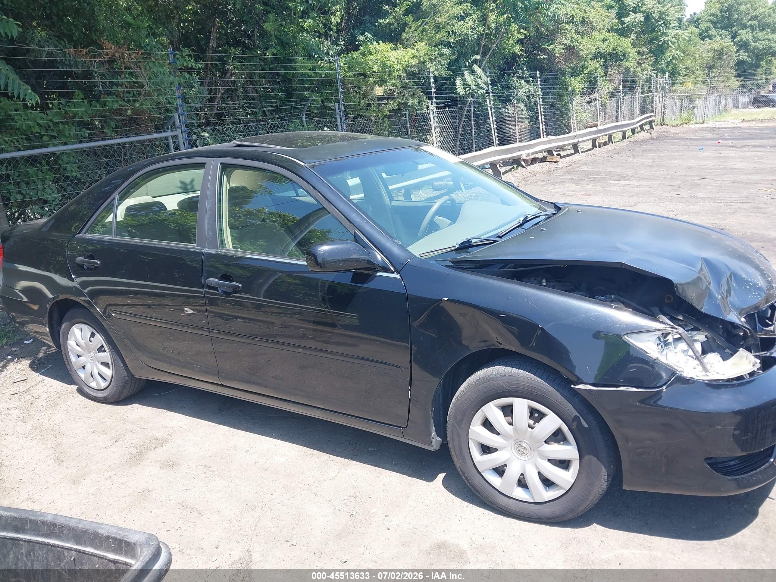 2005 Toyota Camry Le Black vin: JTDBE30K553033529