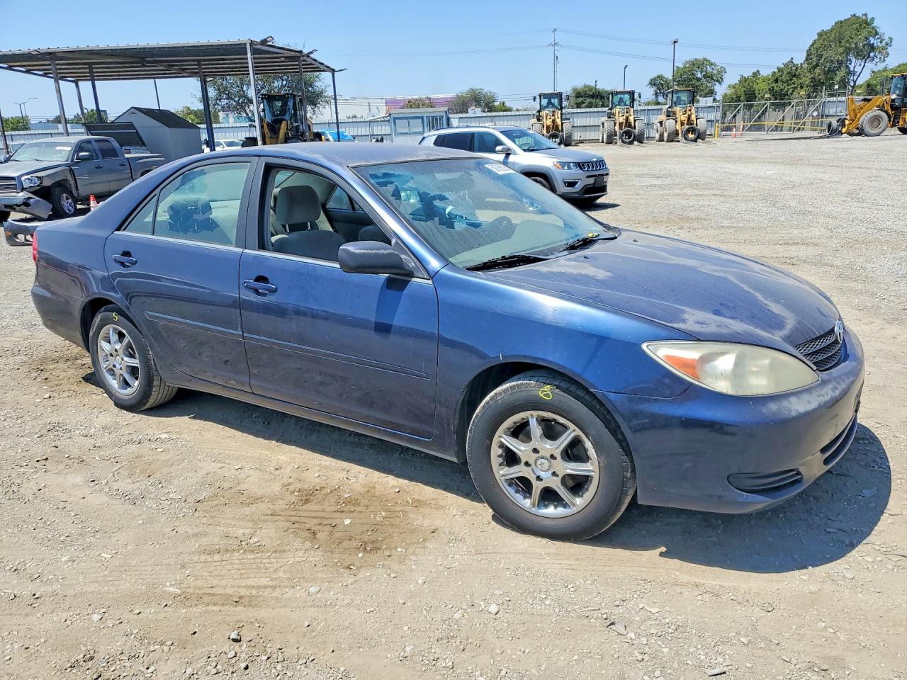 2002 Toyota Camry Le Blue vin: JTDBE32K020018124