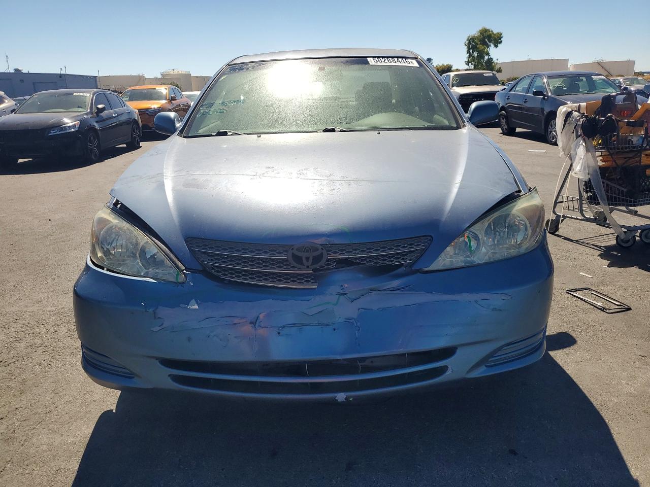 2002 Toyota Camry Le Blue vin: JTDBE32K020121995