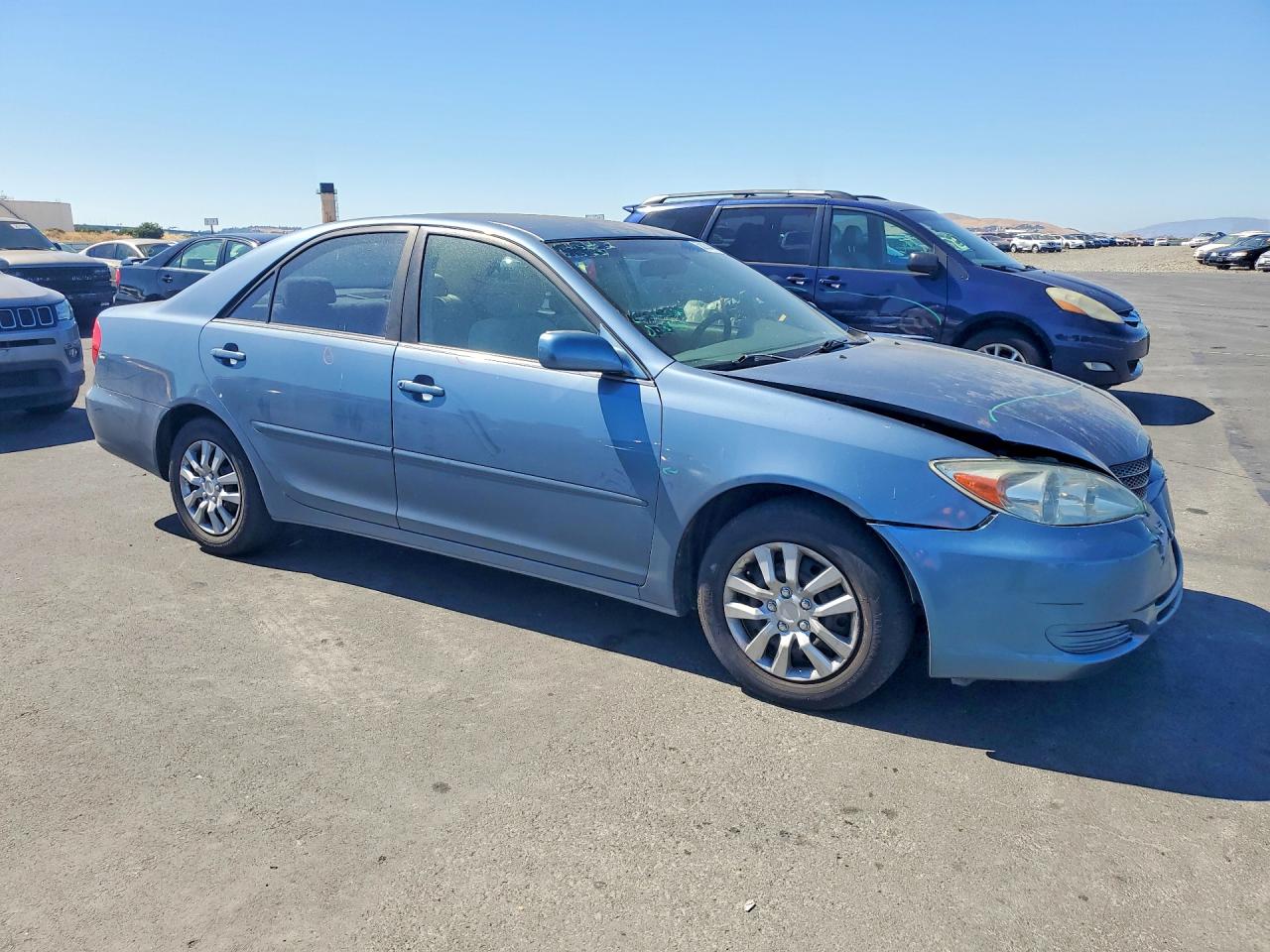 2002 Toyota Camry Le Blue vin: JTDBE32K020121995
