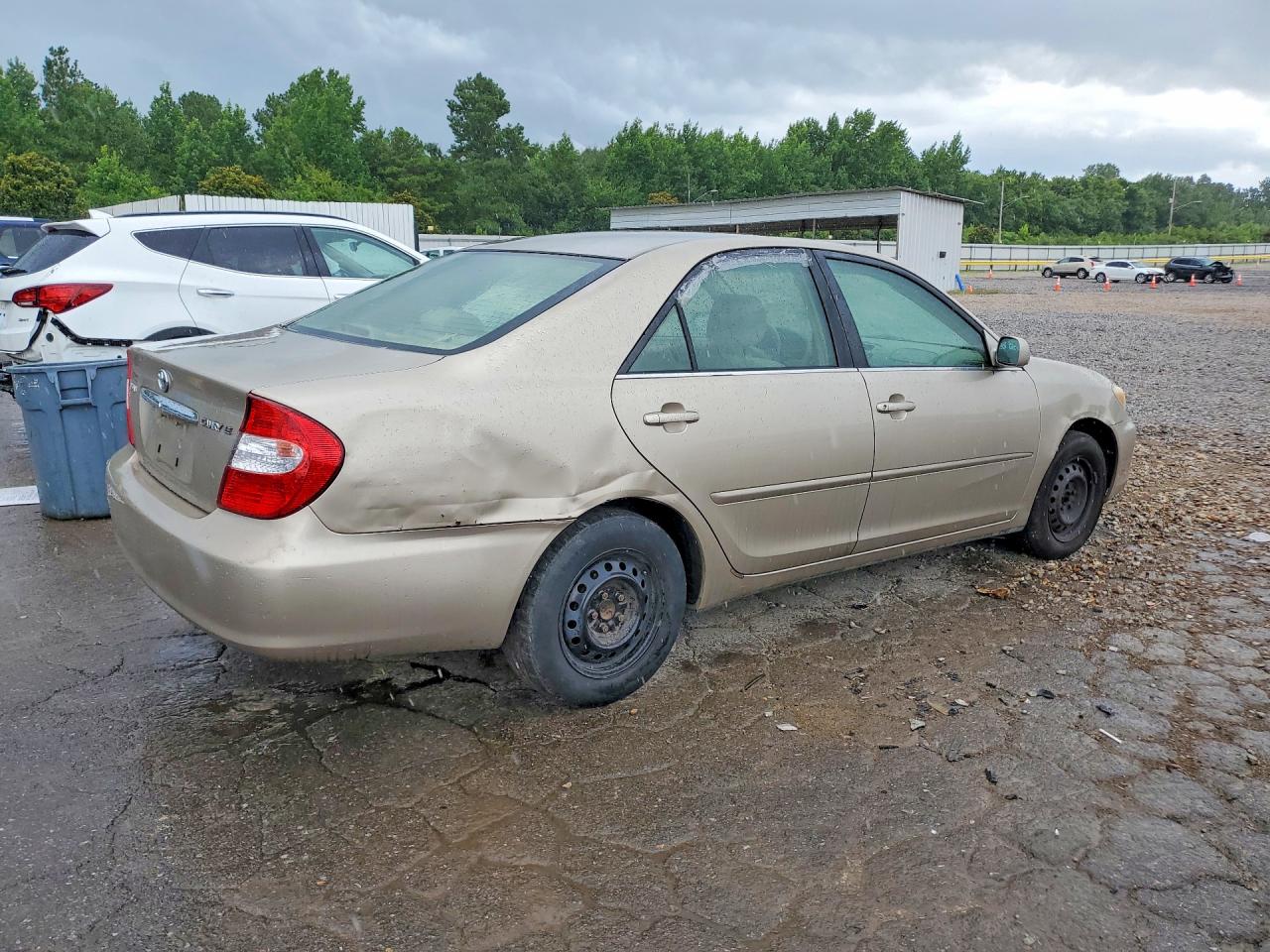2003 Toyota Camry Le Tan vin: JTDBE32K030193863