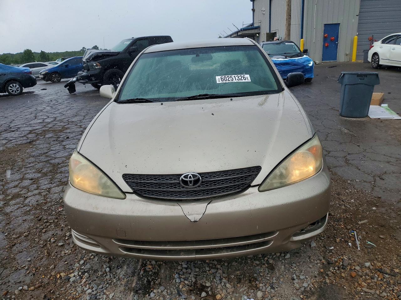 2003 Toyota Camry Le Tan vin: JTDBE32K030193863