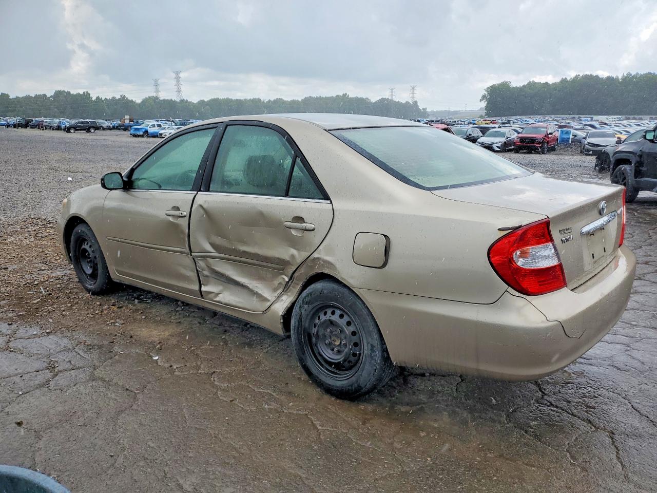 2003 Toyota Camry Le Tan vin: JTDBE32K030193863