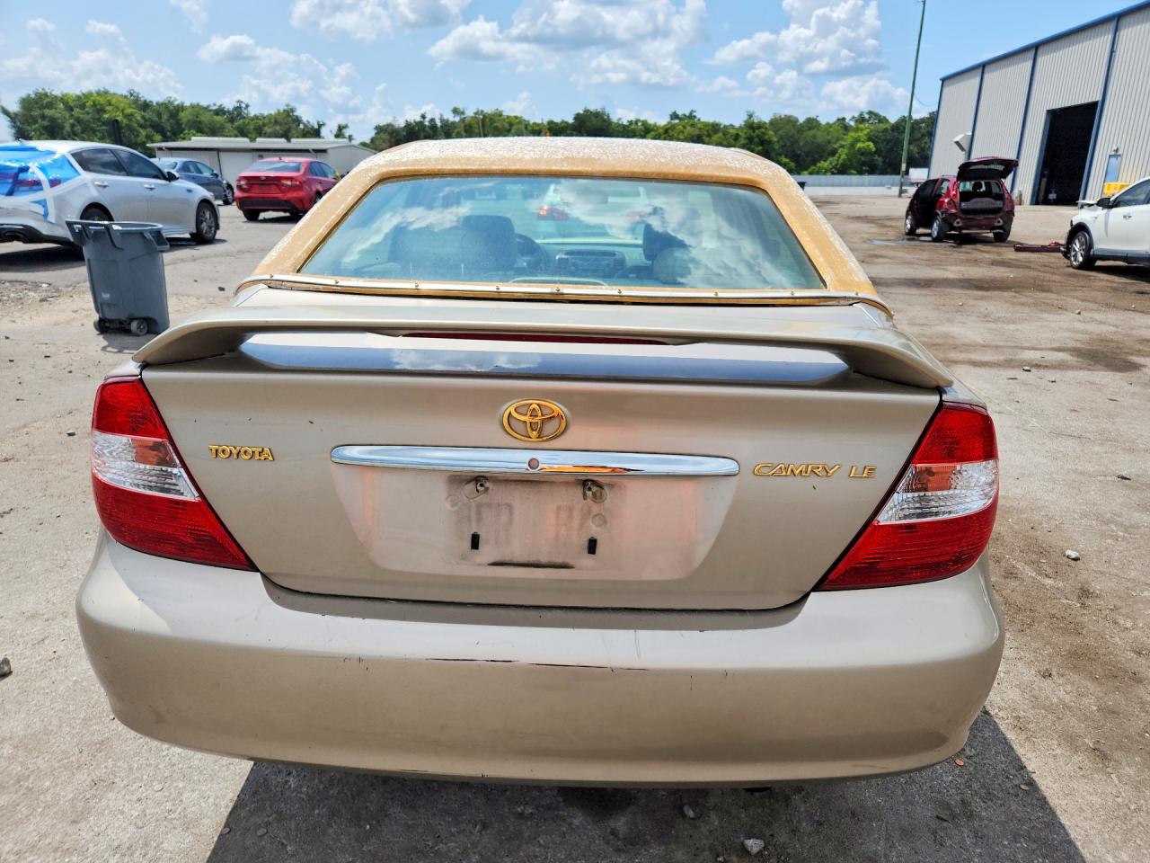2004 Toyota Camry Le Tan vin: JTDBE32K040262259