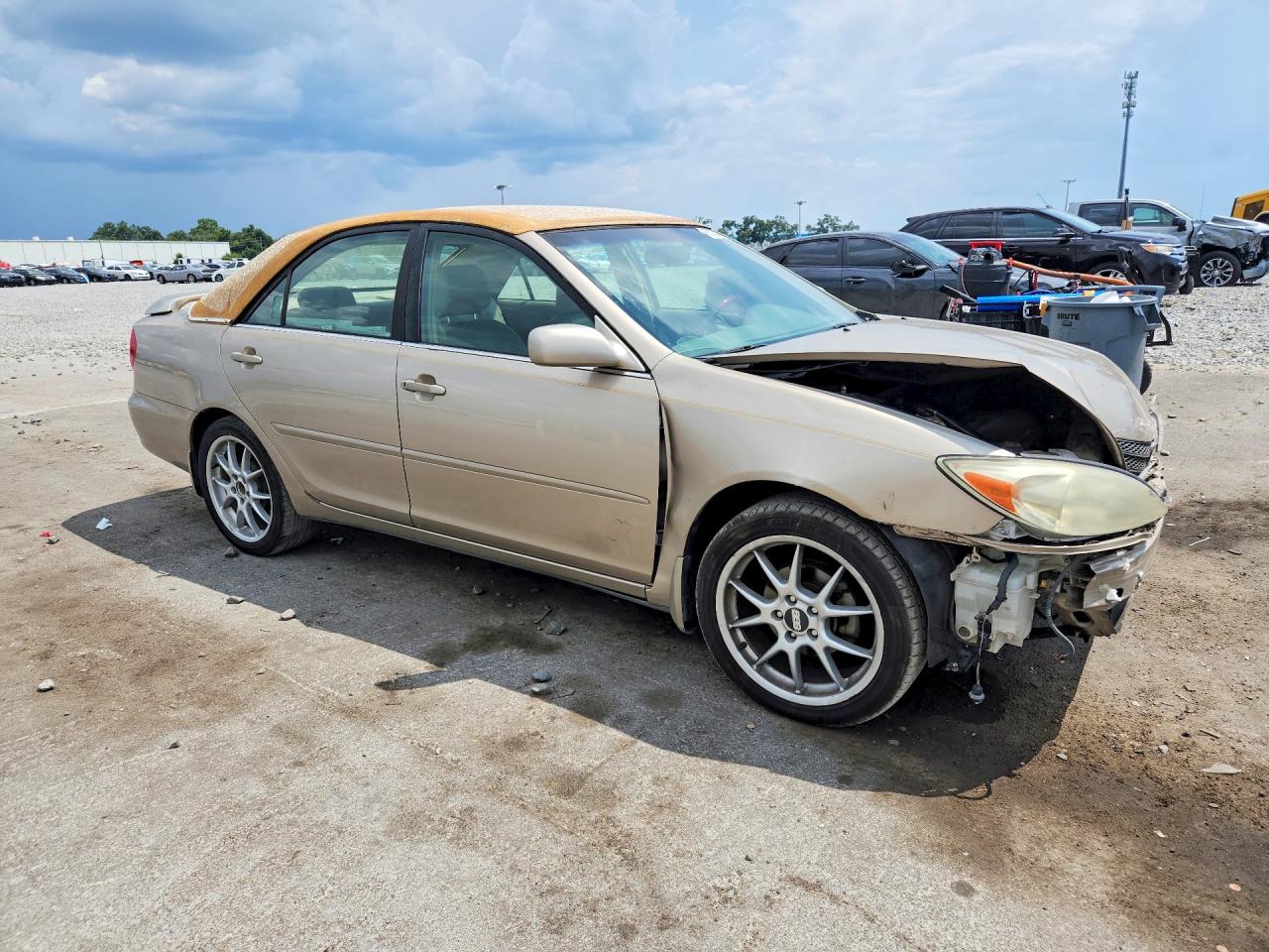 2004 Toyota Camry Le Tan vin: JTDBE32K040262259