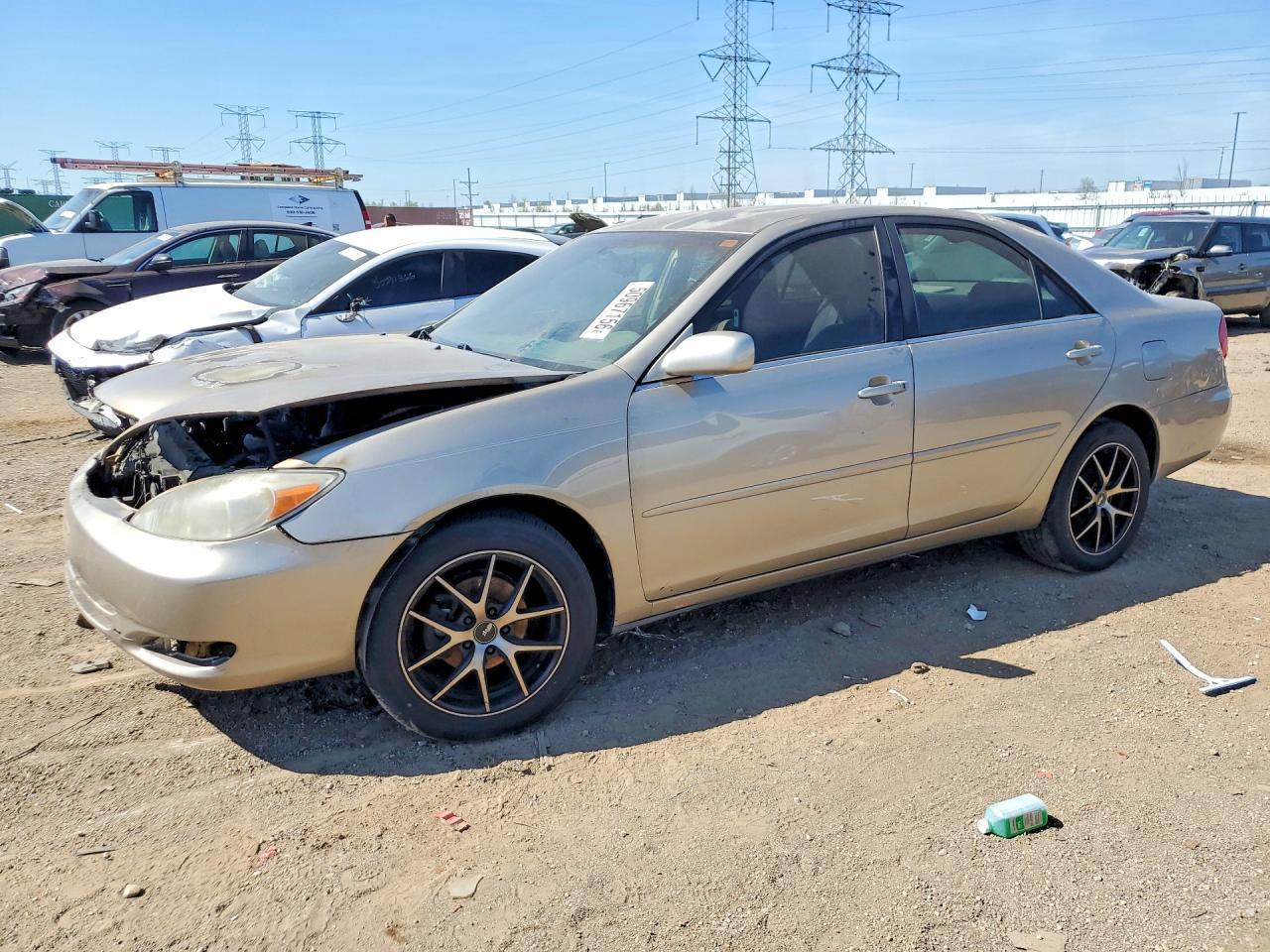 2002 Toyota Camry Le Tan vin: JTDBE32K120052279