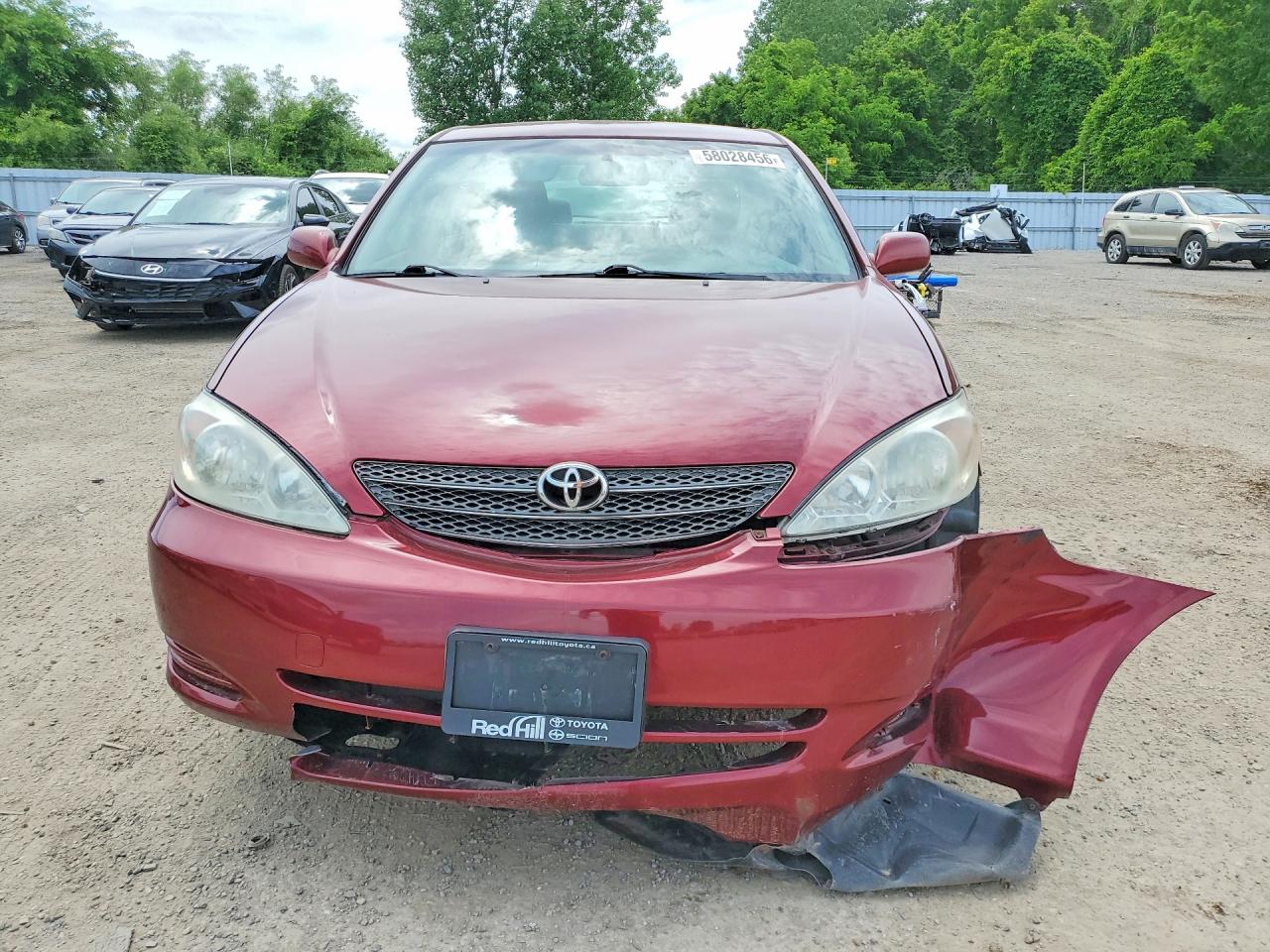 2002 Toyota Camry Le Maroon vin: JTDBE32K220073335