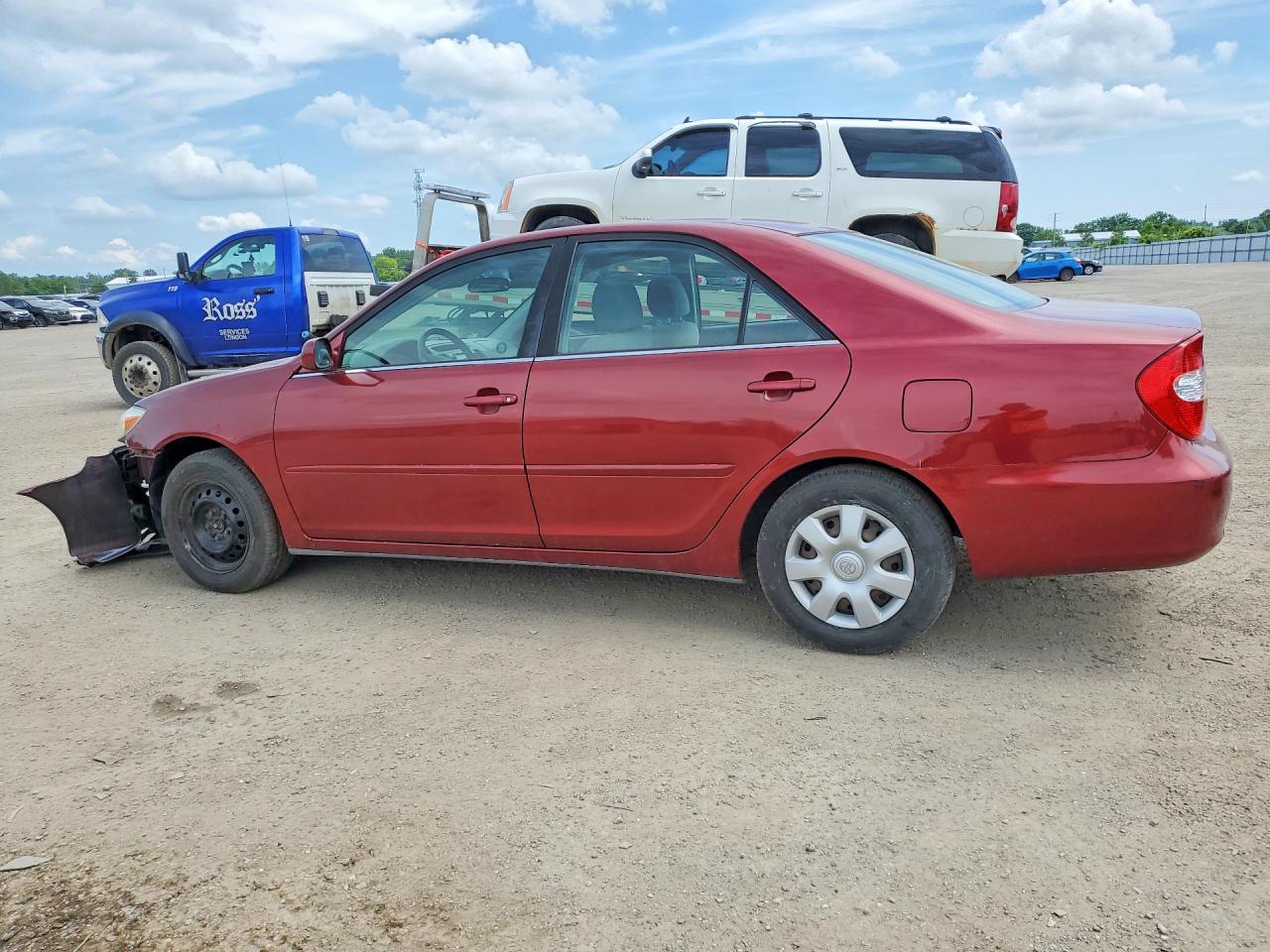 2002 Toyota Camry Le Maroon vin: JTDBE32K220073335