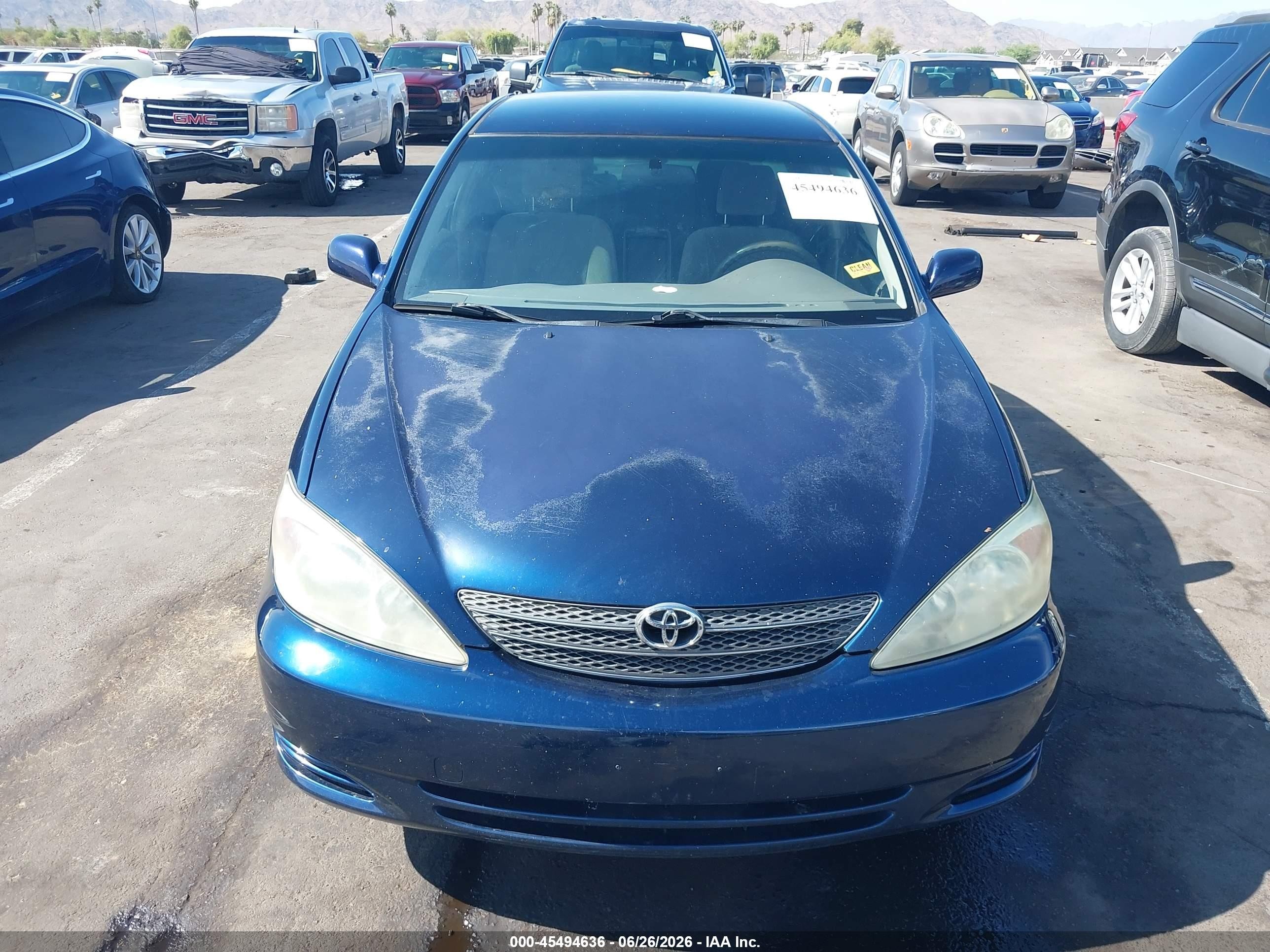2002 Toyota Camry Le Blue vin: JTDBE32K220123652