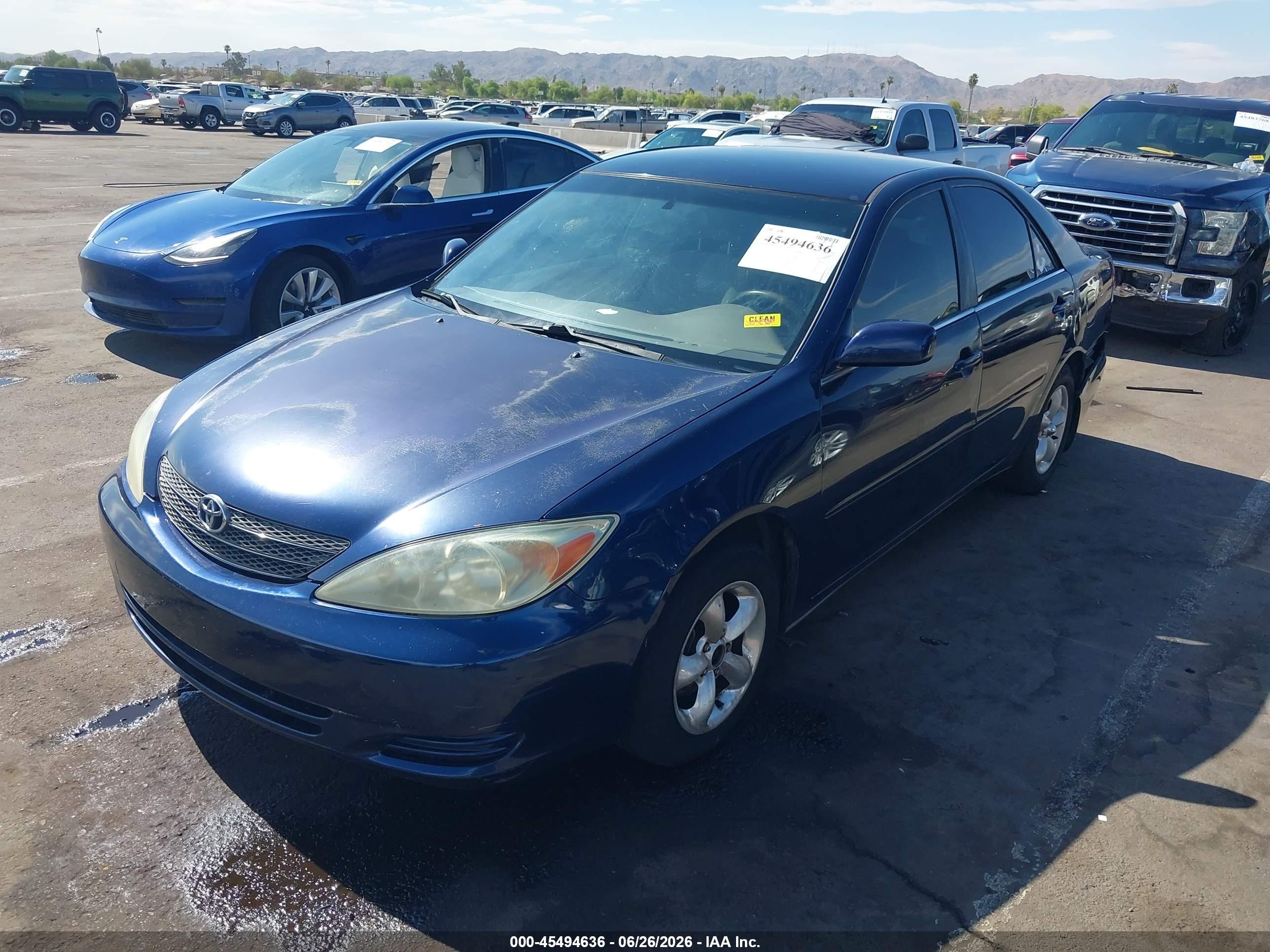 2002 Toyota Camry Le Blue vin: JTDBE32K220123652