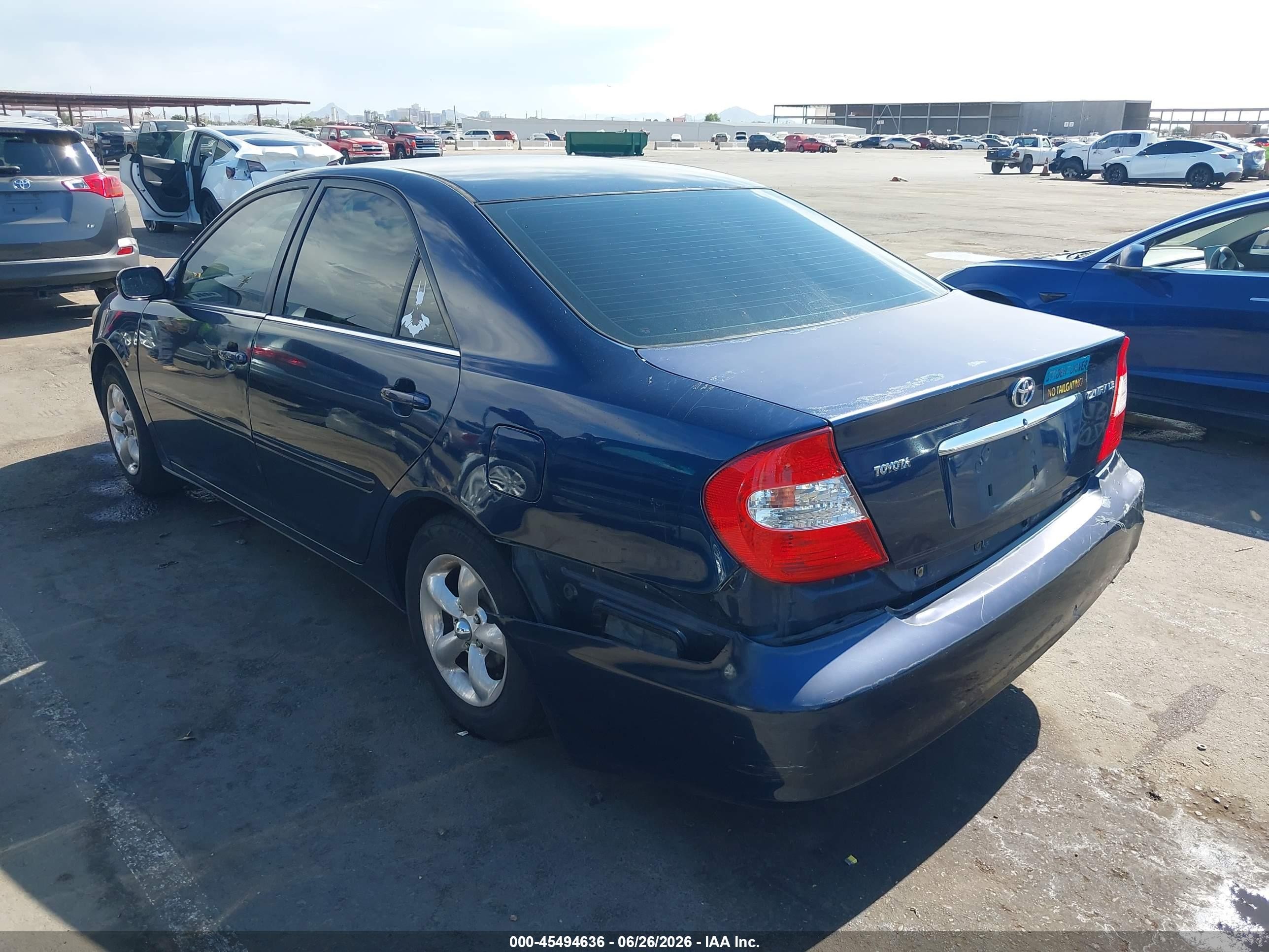 2002 Toyota Camry Le Blue vin: JTDBE32K220123652