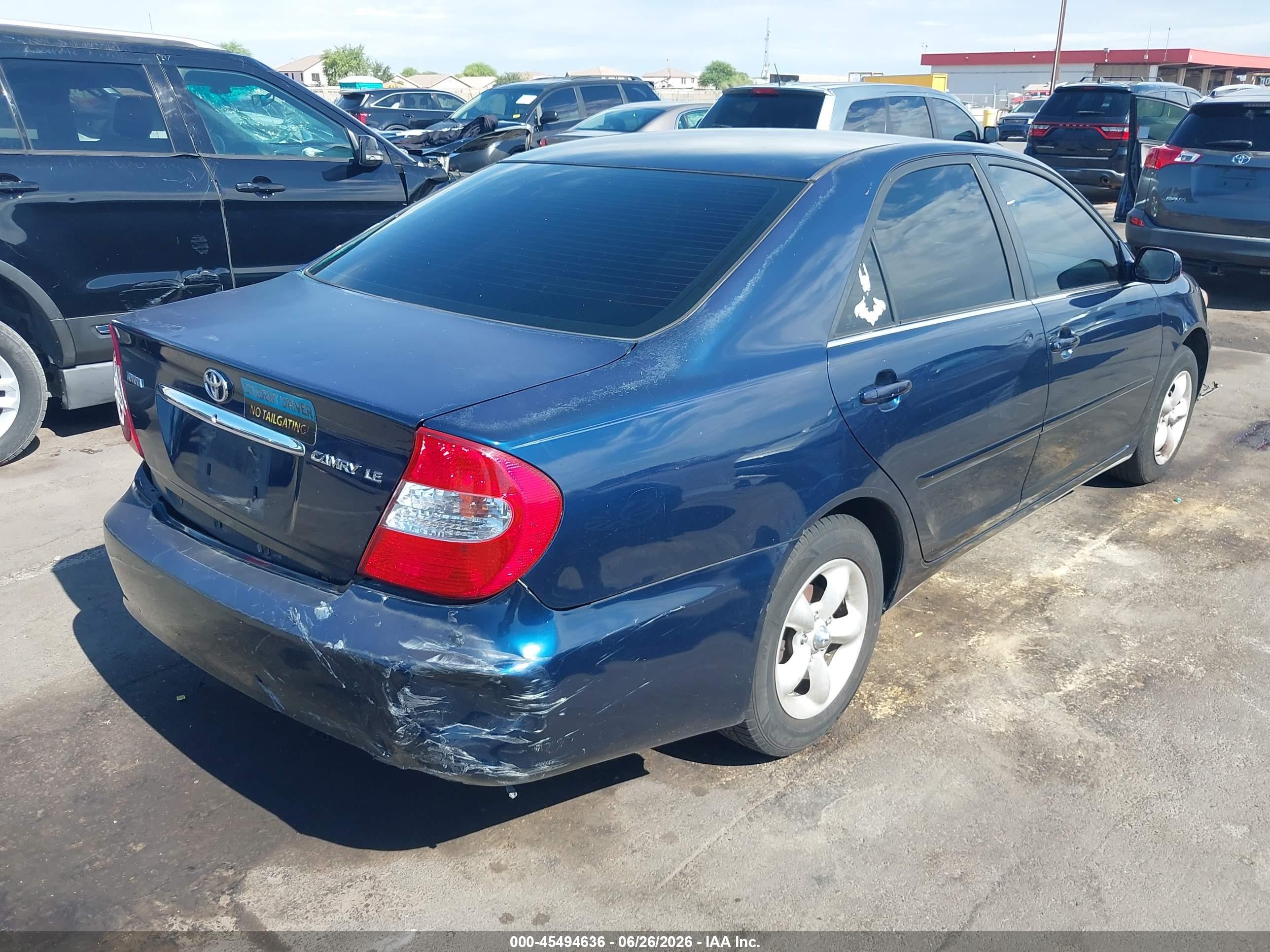 2002 Toyota Camry Le Blue vin: JTDBE32K220123652