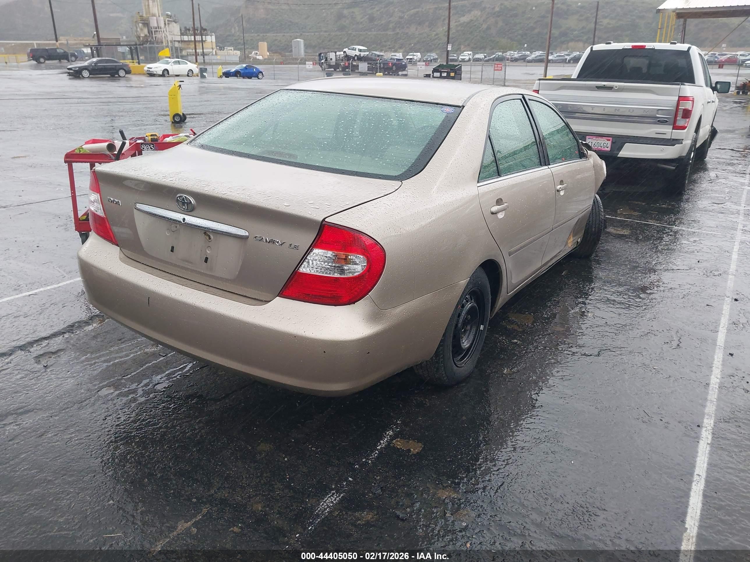 2002 Toyota Camry Le Beige vin: JTDBE32K320127970