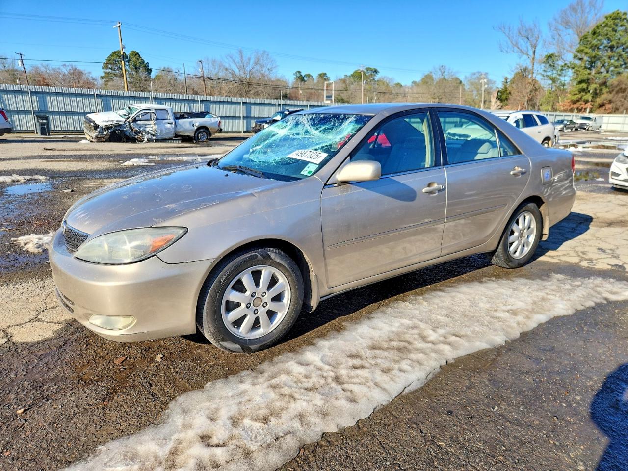 2004 Toyota Camry Le Tan vin: JTDBE32K340292579