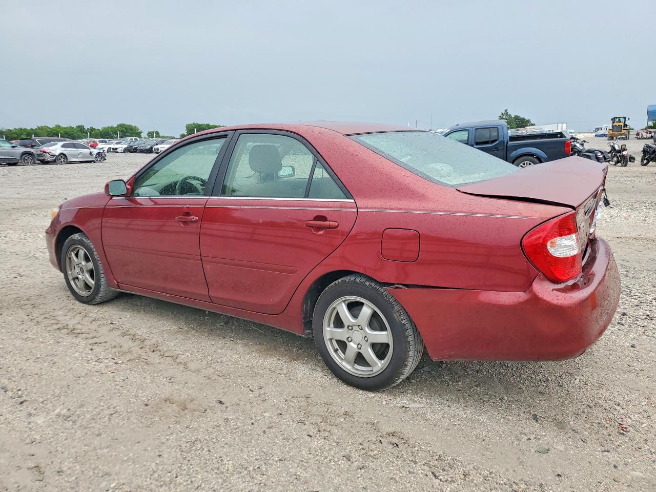 2004 Toyota Camry Le Maroon vin: JTDBE32K340299130