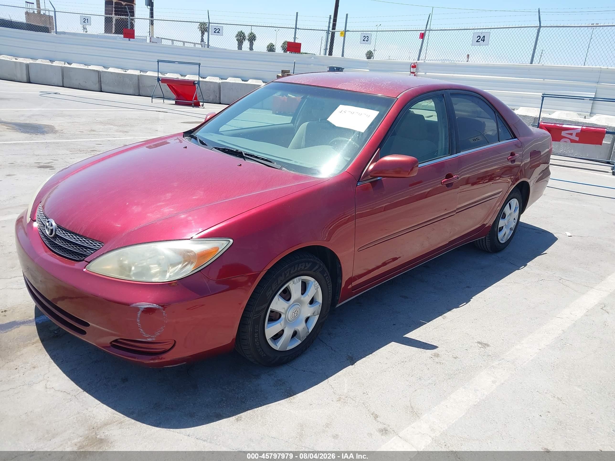 2002 Toyota Camry Le Burgundy vin: JTDBE32K420110644