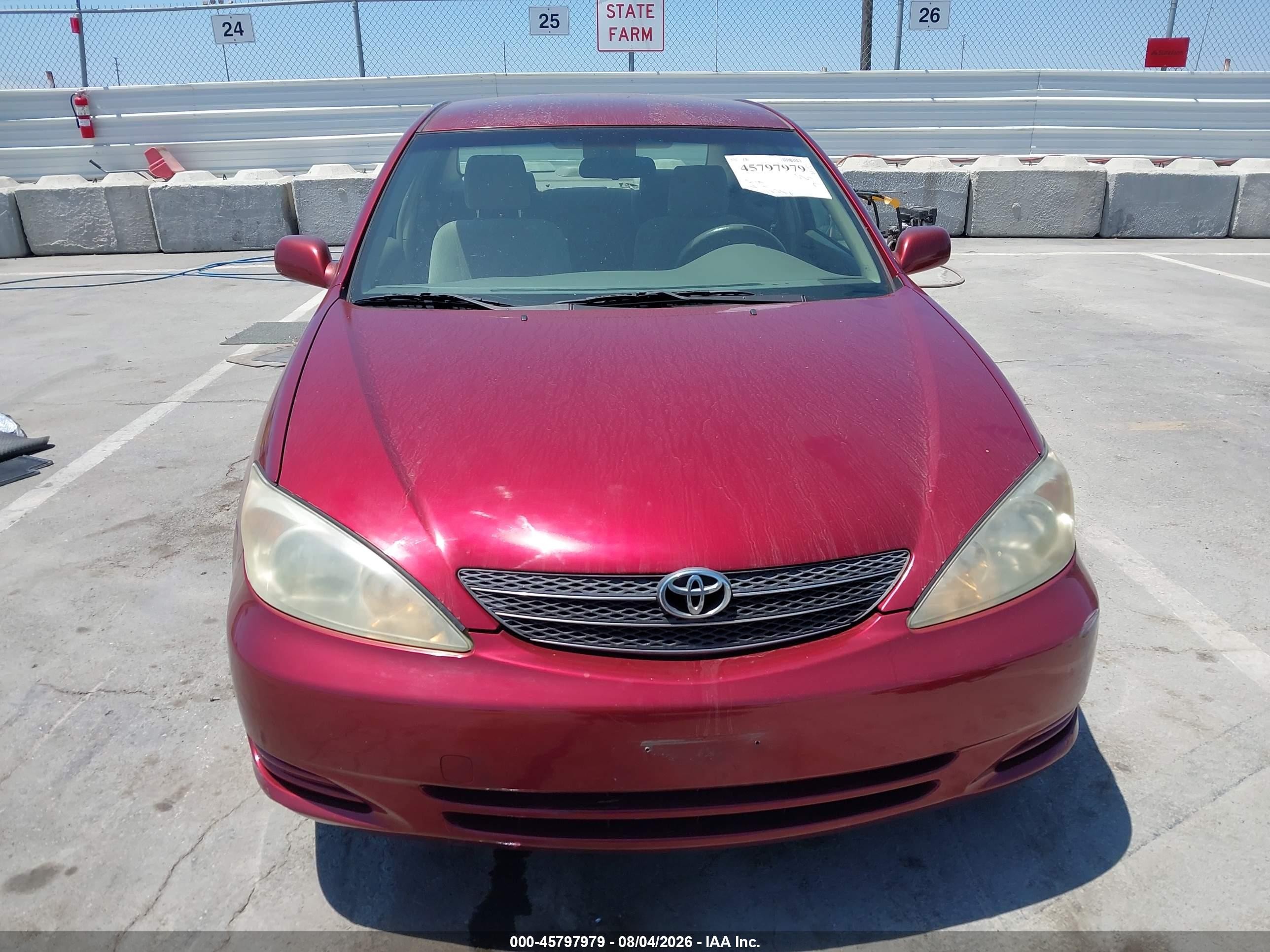 2002 Toyota Camry Le Burgundy vin: JTDBE32K420110644