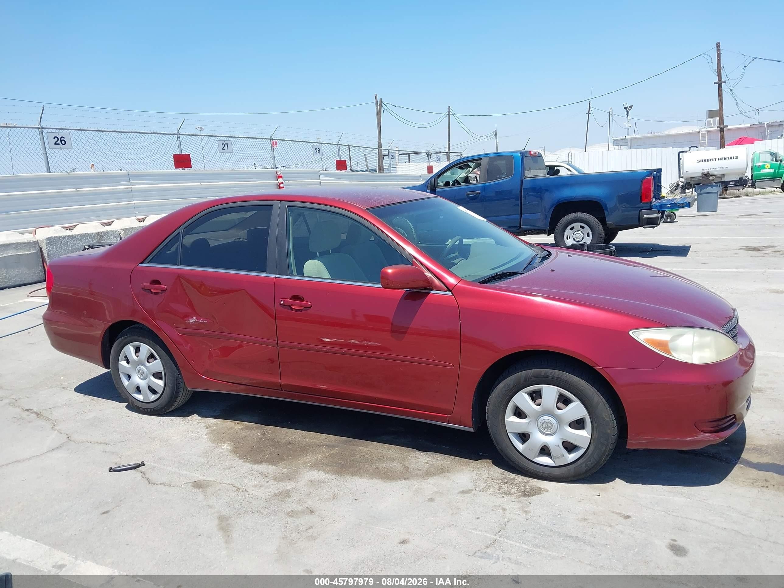 2002 Toyota Camry Le Burgundy vin: JTDBE32K420110644