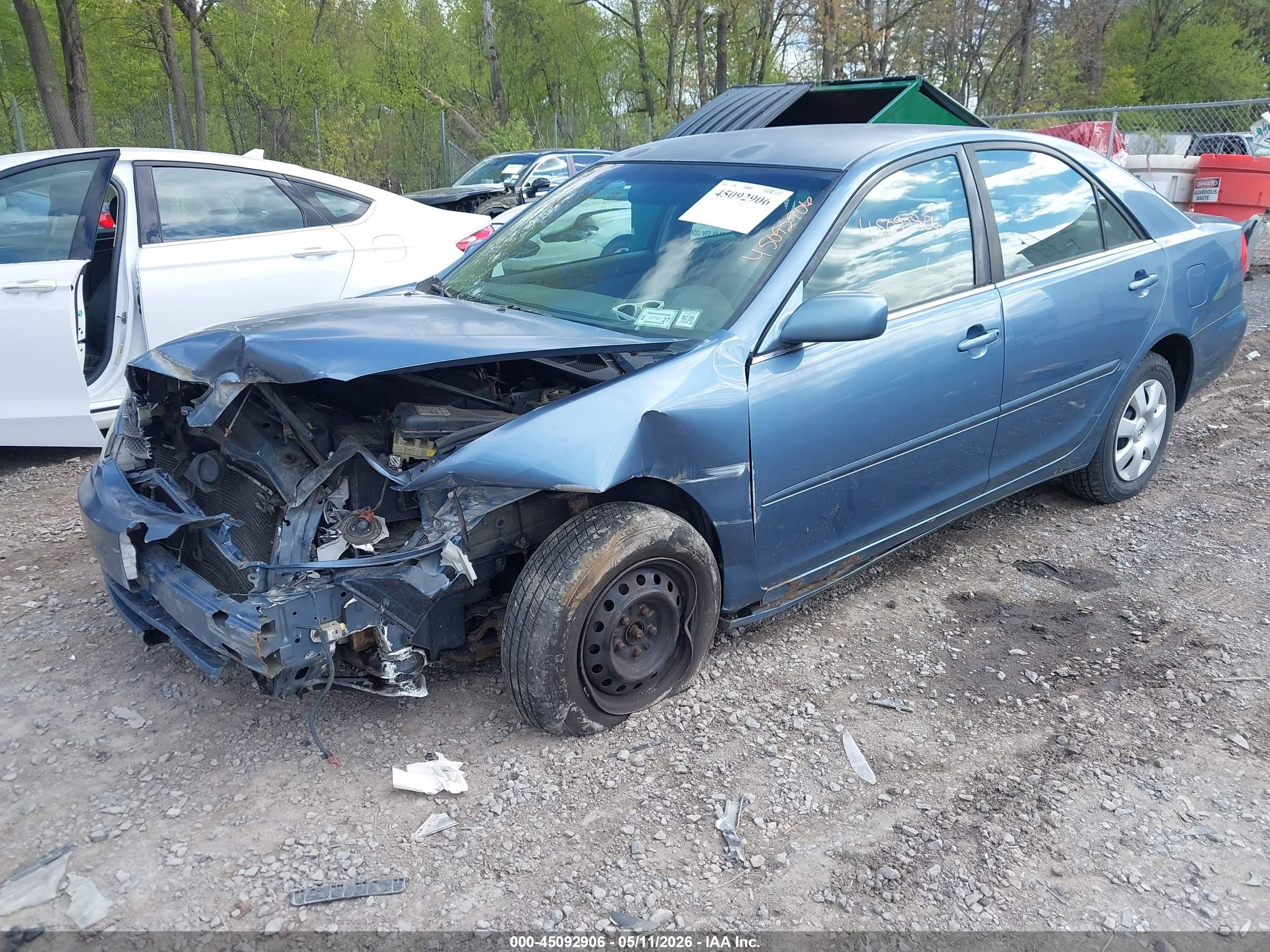 2002 Toyota Camry Le Blue vin: JTDBE32K520020712
