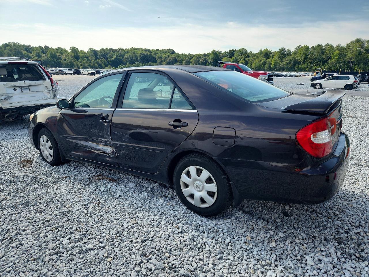 2002 Toyota Camry Le Brown vin: JTDBE32K520040085