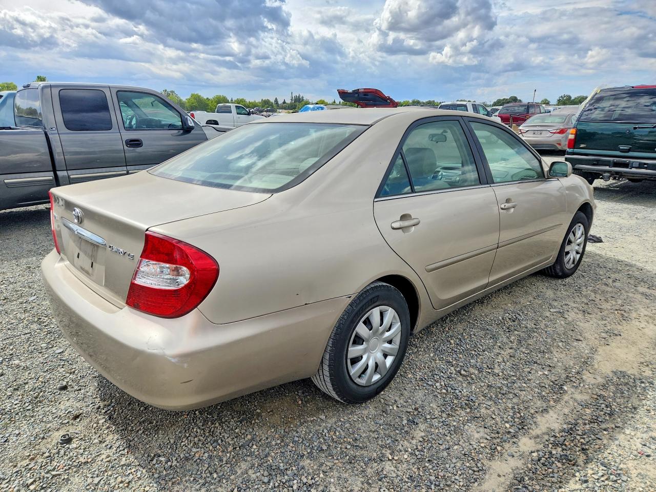 2002 Toyota Camry Le Beige vin: JTDBE32K520115786