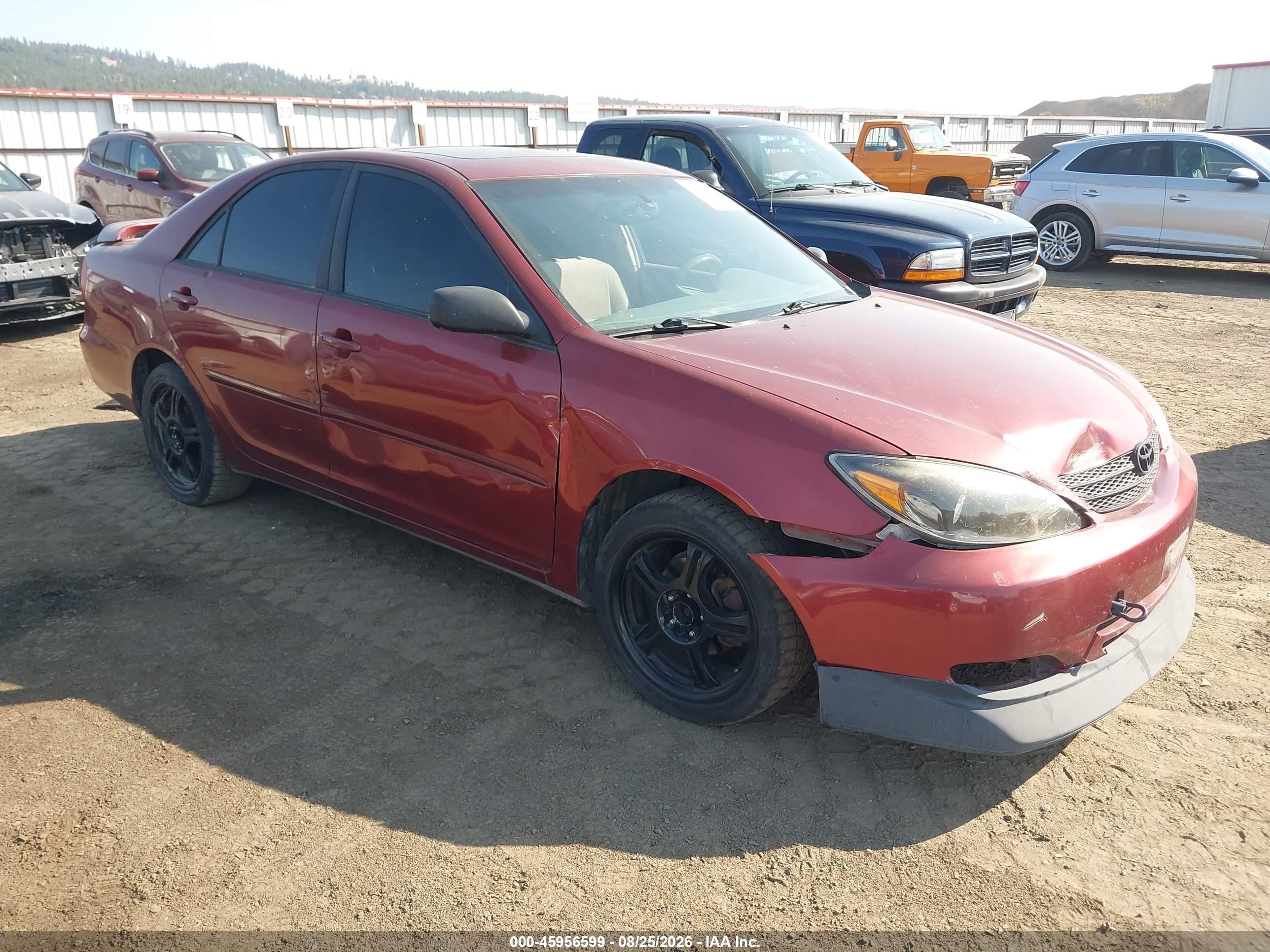 2002 Toyota Camry Le Burgundy vin: JTDBE32K520117635