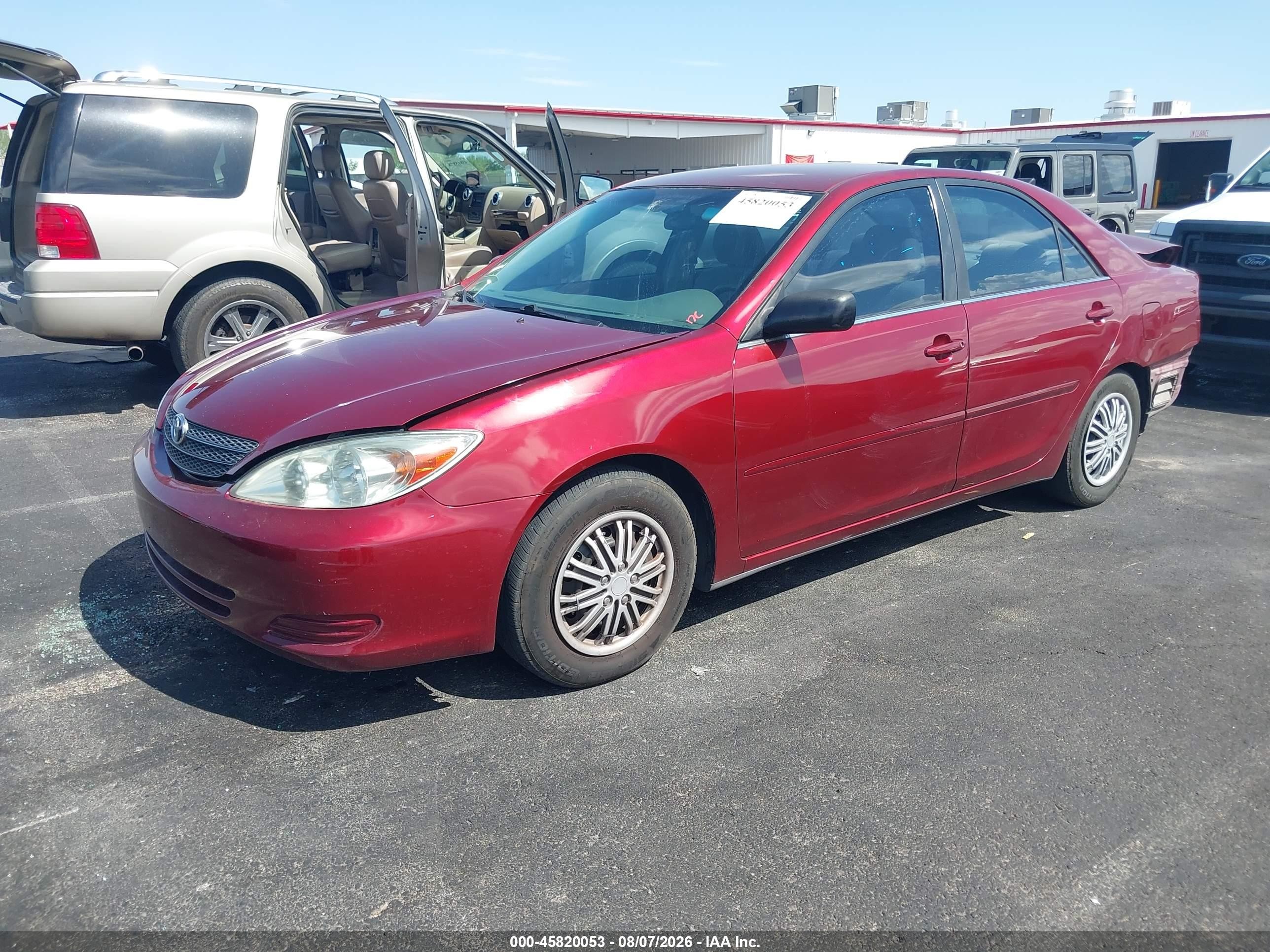 2003 Toyota Camry Le Red vin: JTDBE32K530146764