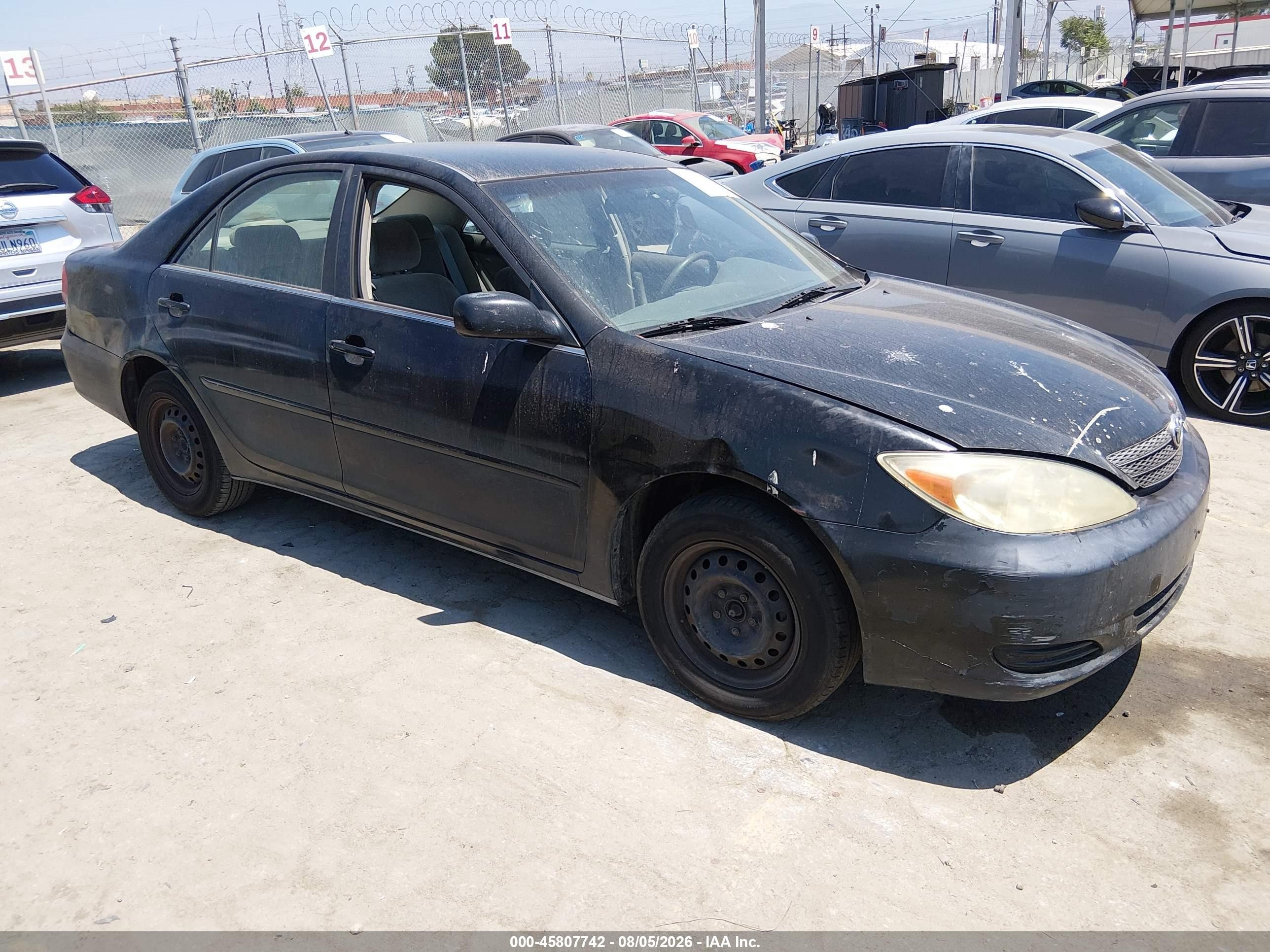 2003 Toyota Camry Le Black vin: JTDBE32K530184897