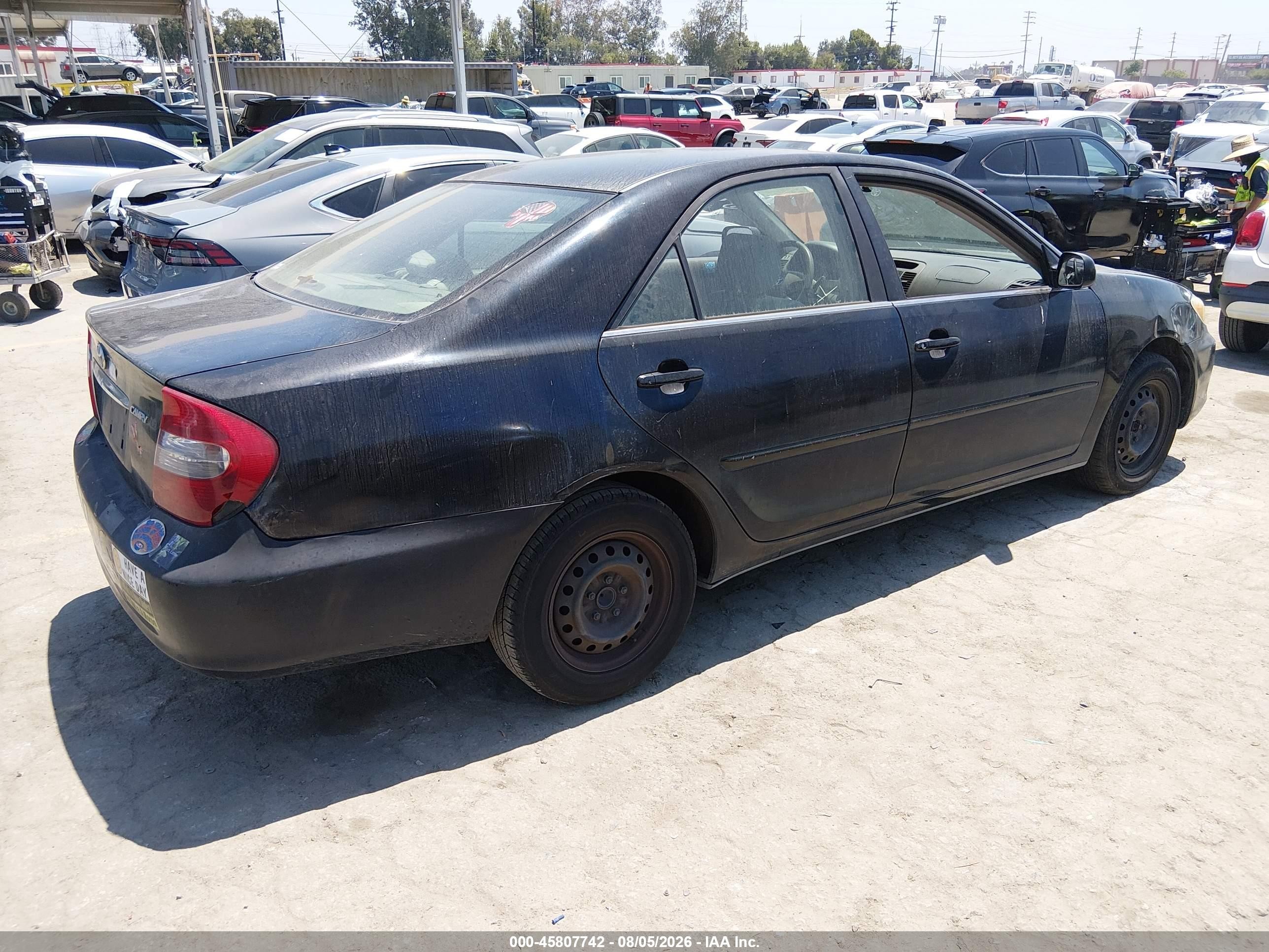 2003 Toyota Camry Le Черный vin: JTDBE32K530184897